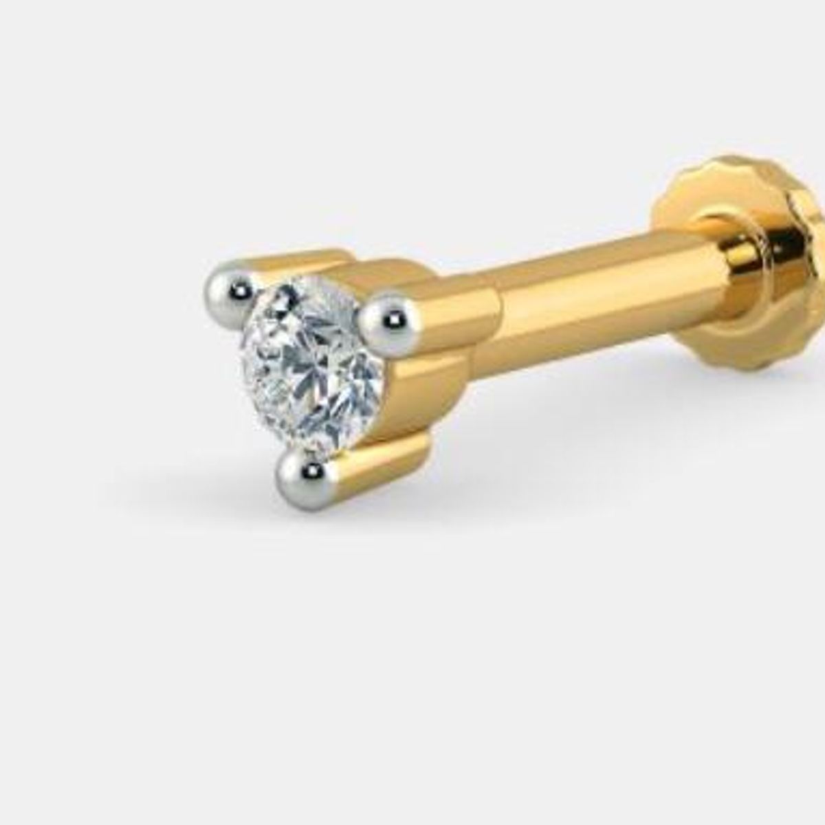 Solitaire diamond nosepin in yellow gold by Venus Jewellers