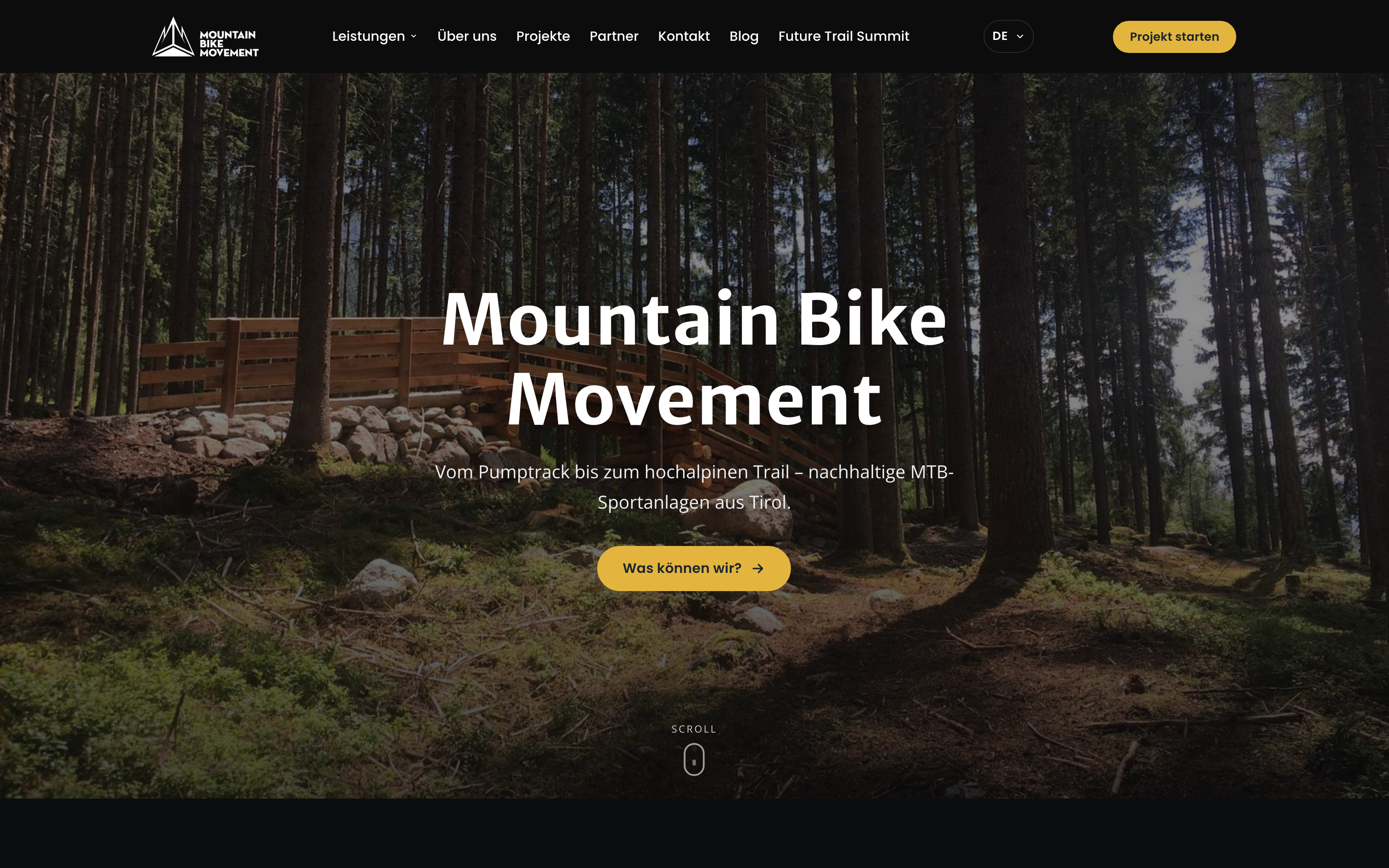 Mountain Bike Movement: Startseite von mountainbikemovement.com mit einem Trail im Wald