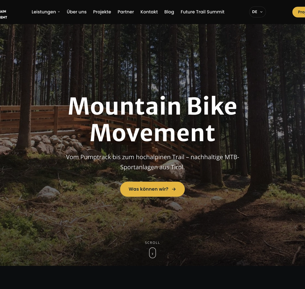 Mountain Bike Movement: Startseite von mountainbikemovement.com mit einem Trail im Wald