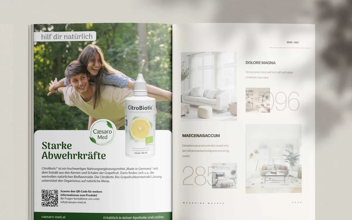 Caesaro Med: Aufgeschlagenes Magazin mit einer Caesaro-Med-Anzeige für CitroBiotic unter der Zeile „Starke Abwehrkräfte"