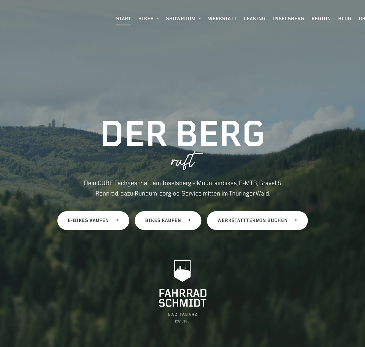 Fahrrad Schmidt: Startseite von fahrrad-schmidt.de mit dem Blick ueber den Thueringer Wald und dem Titel Der Berg ruft