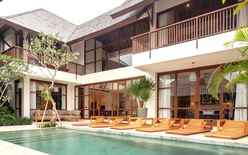 Balinese modern tropical villa in Nyanyi - lush garden with infinity pool