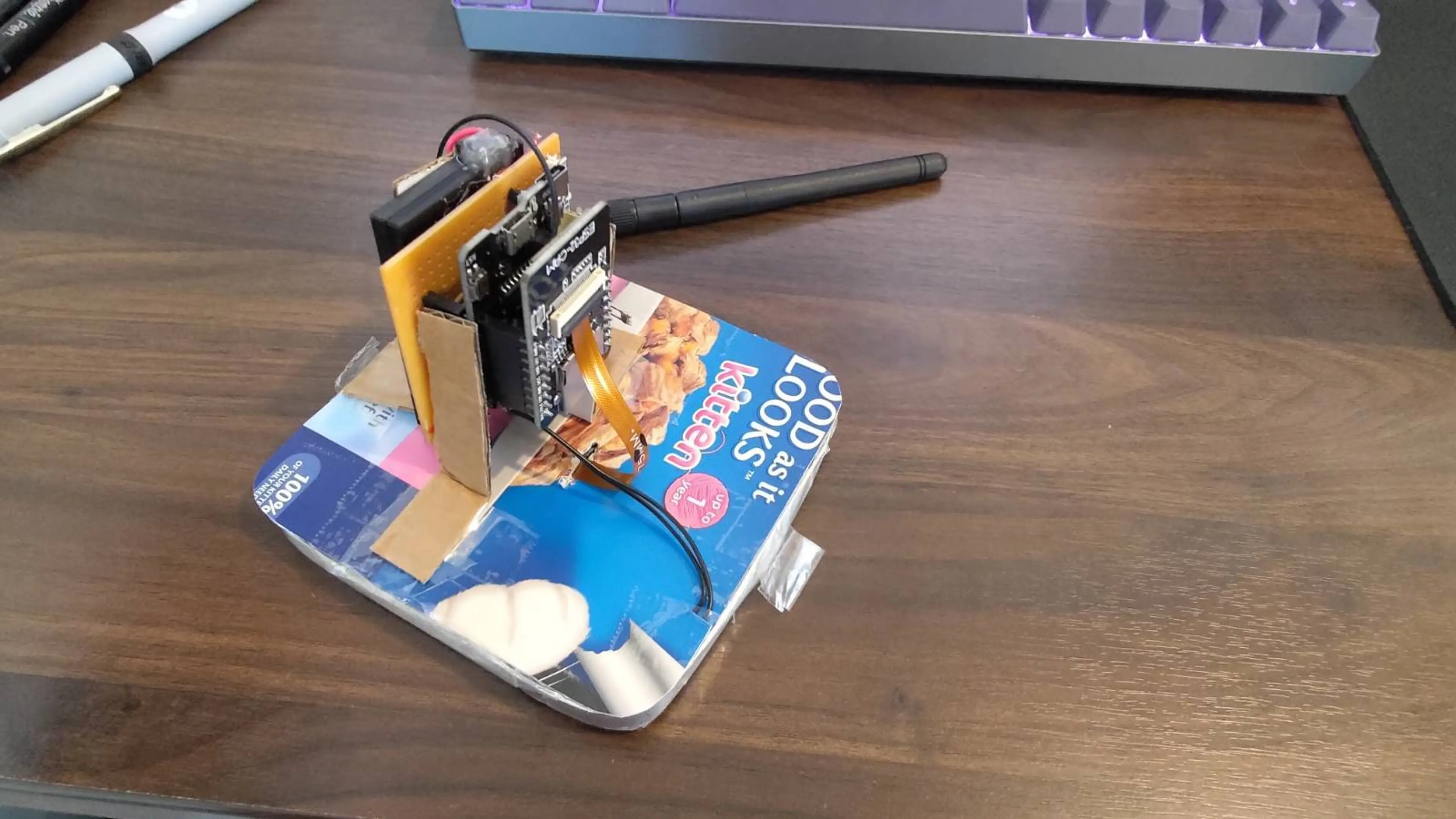 J1's franken-gadget made from cat food boxes and halloween props