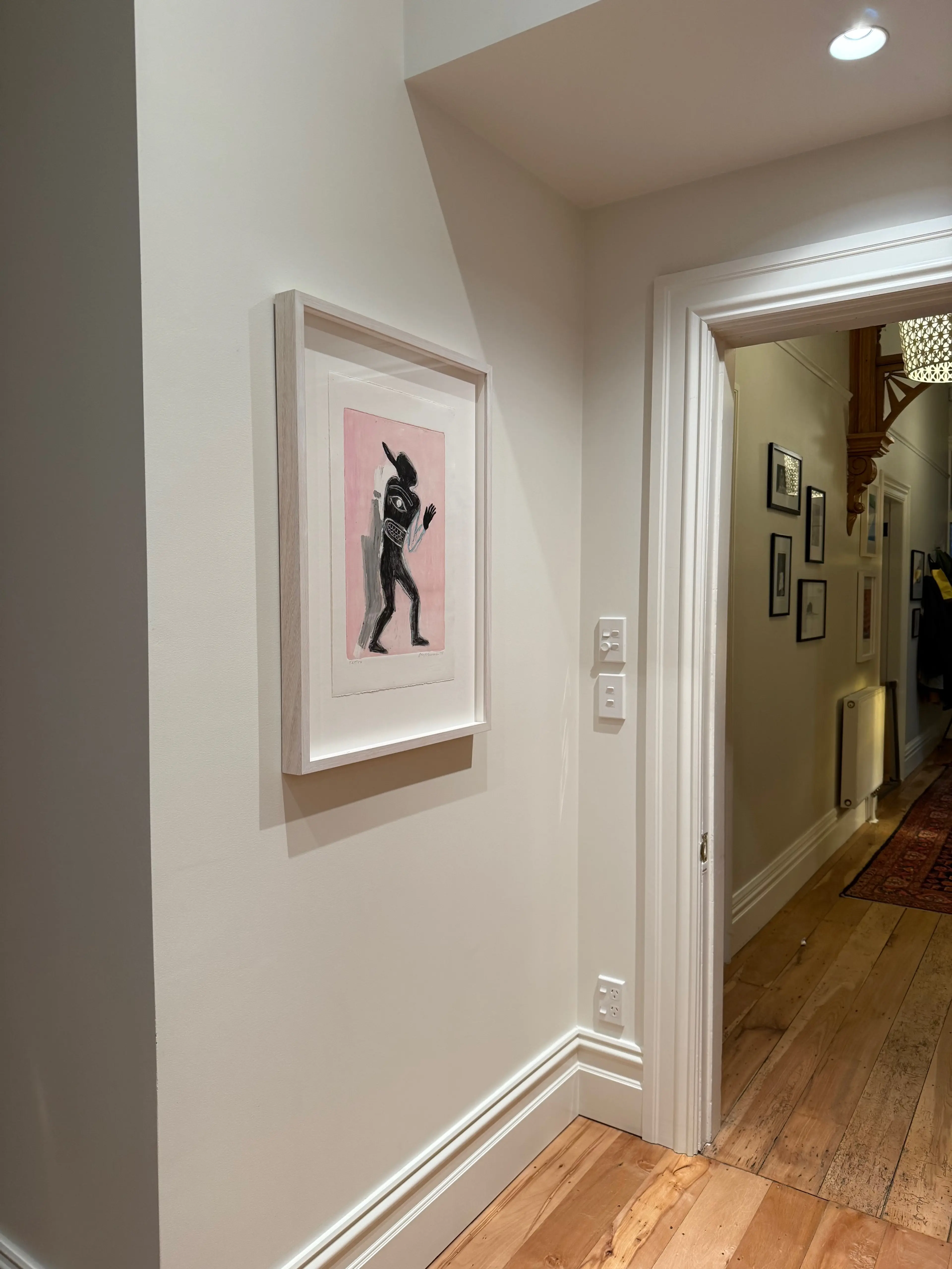 Photo of a Jaune Quick-To-See Smith artwork on the wall.