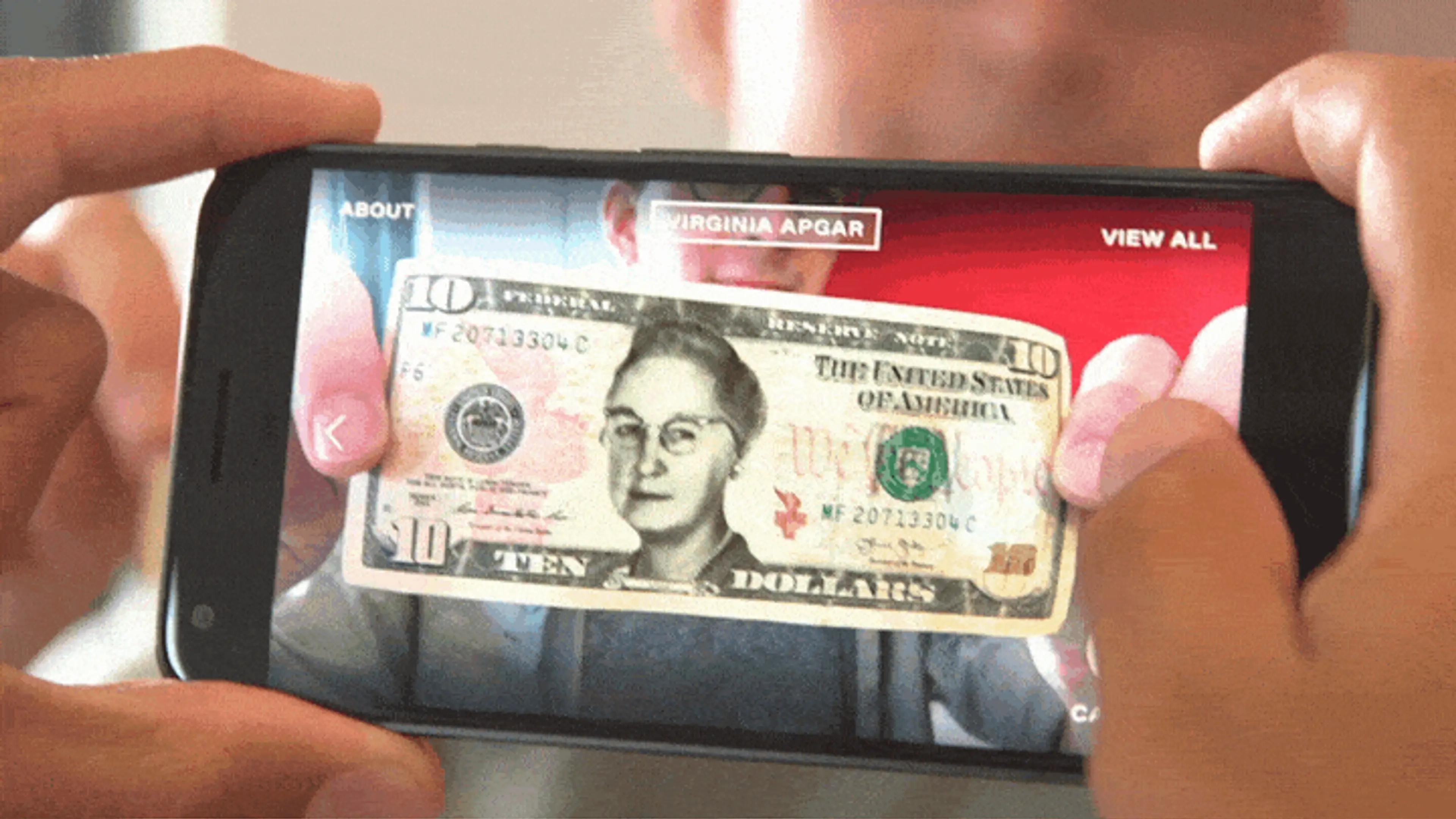 Using AR on a mobile phone, we replaced the face on $10 bills