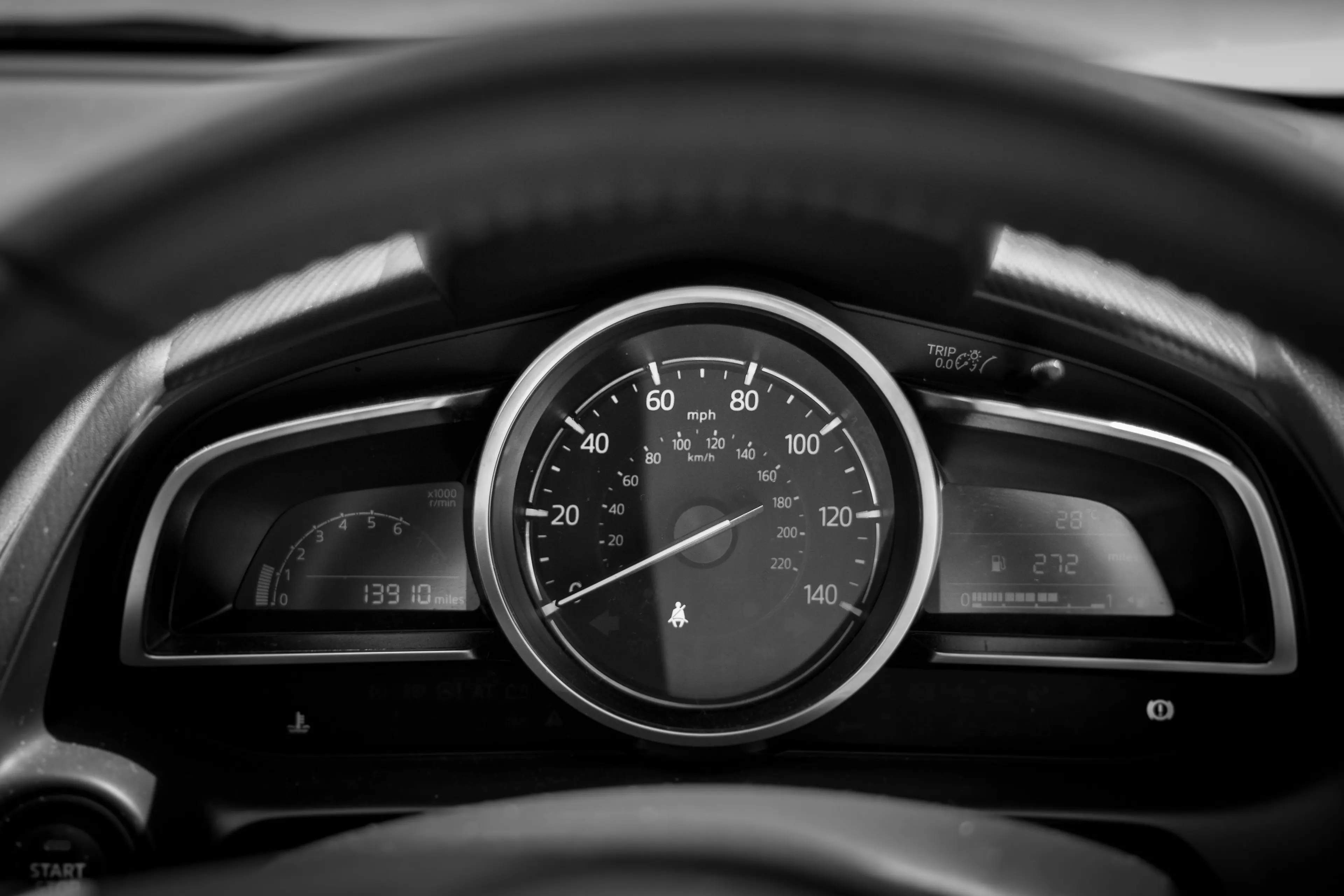 A car dashboard. Photo by Nick Fewings on unsplash