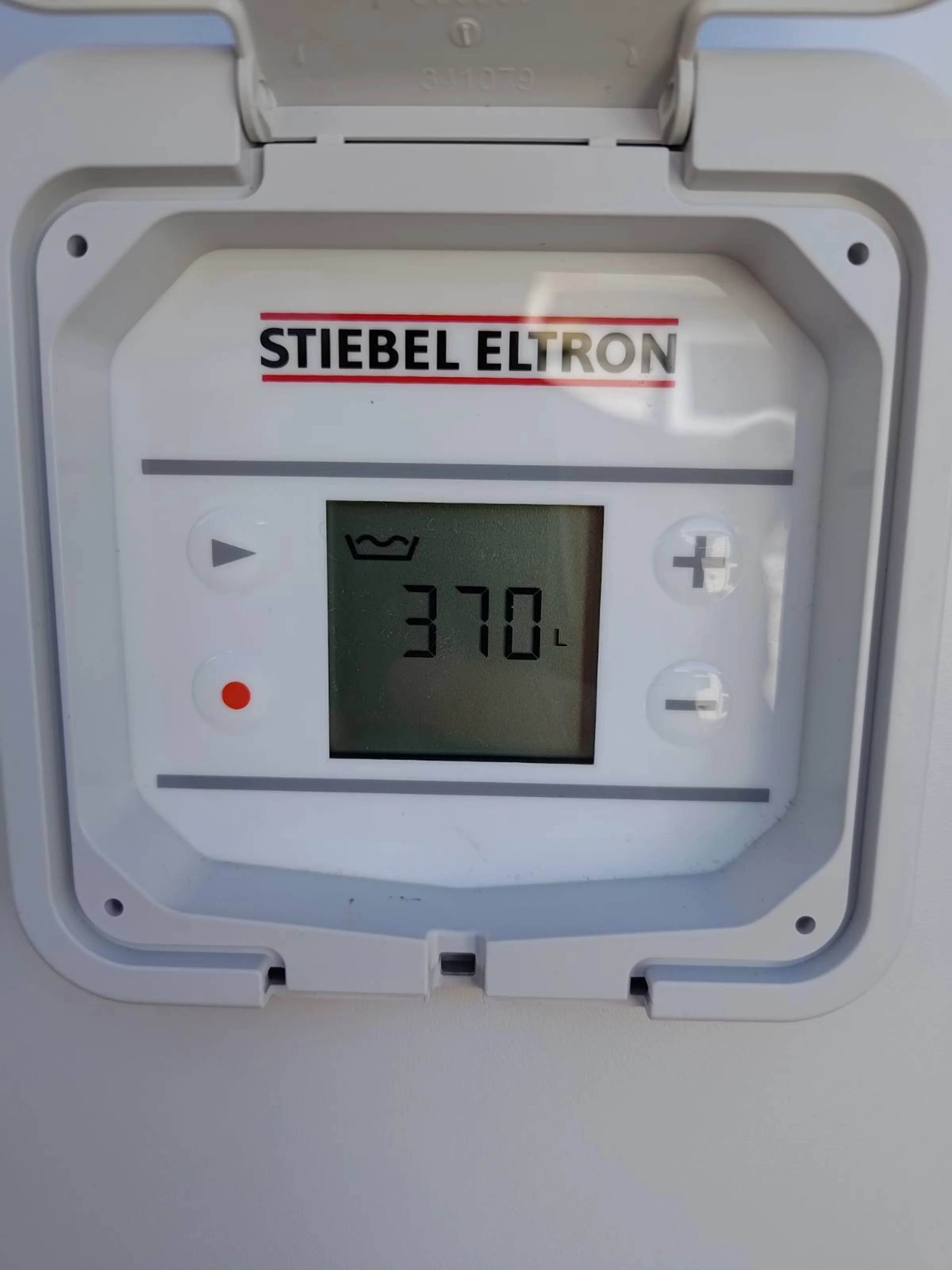 Close up of a heat pump with 370 displayed