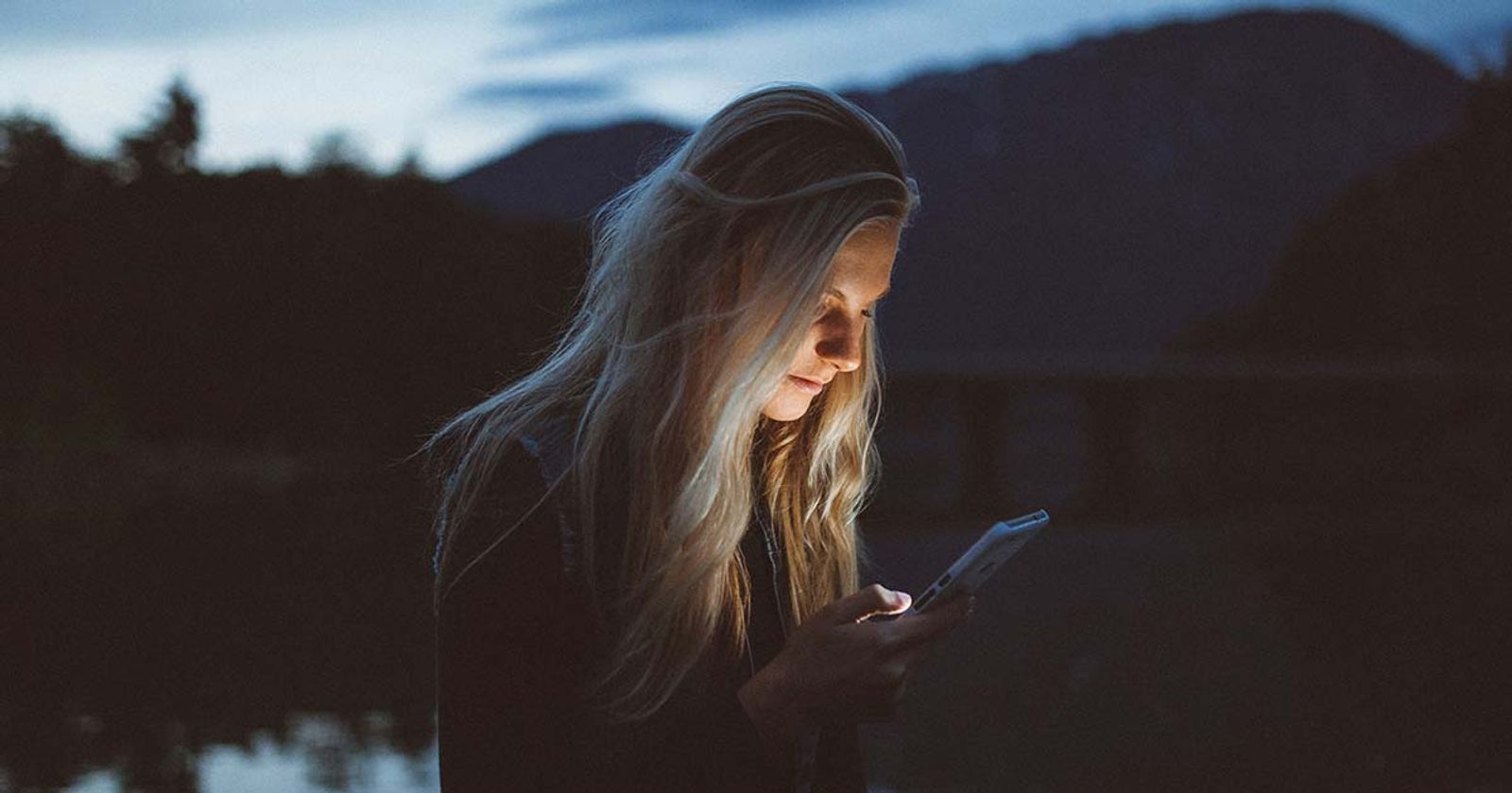 girl with phone for sms marketing