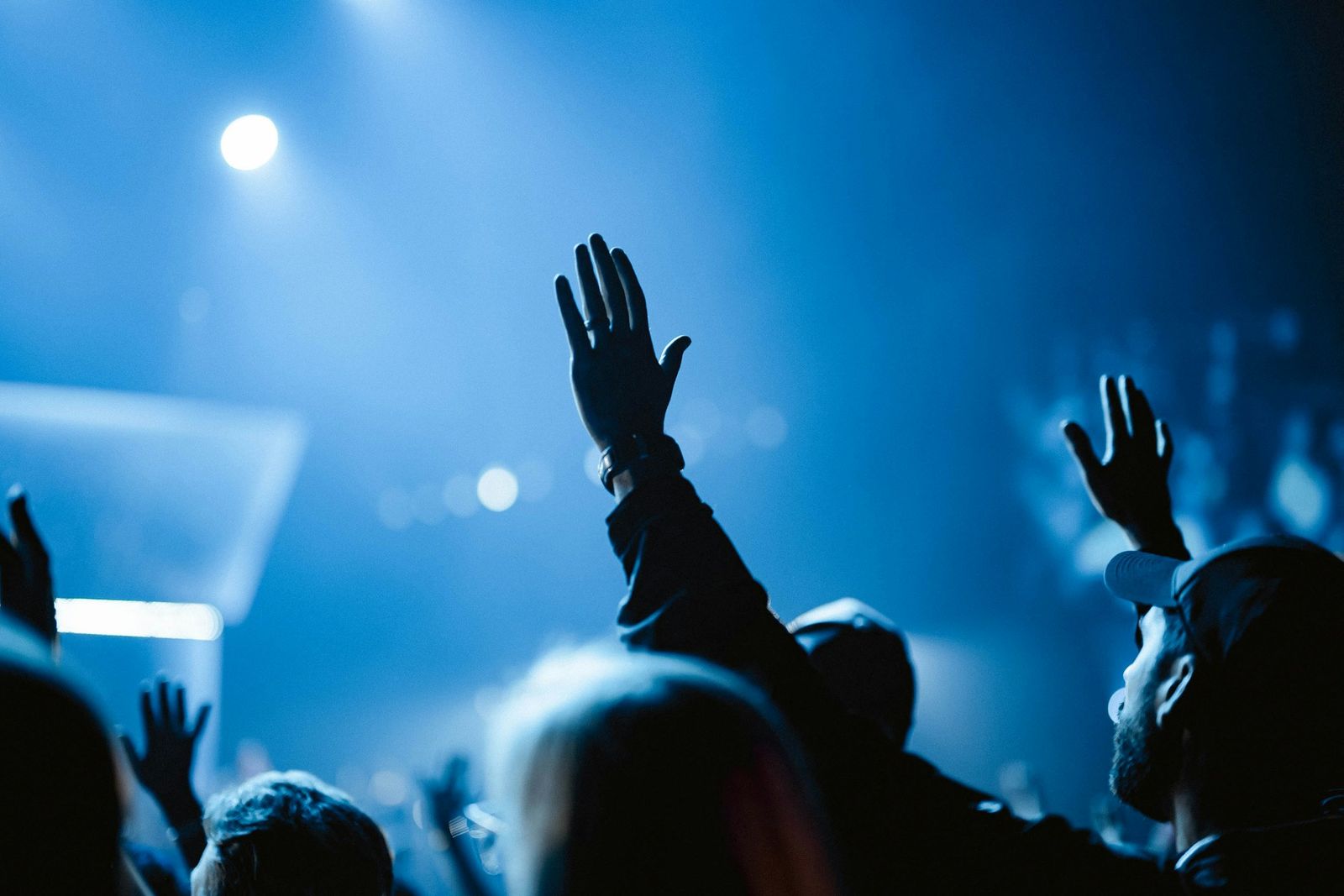 hand raised during performance