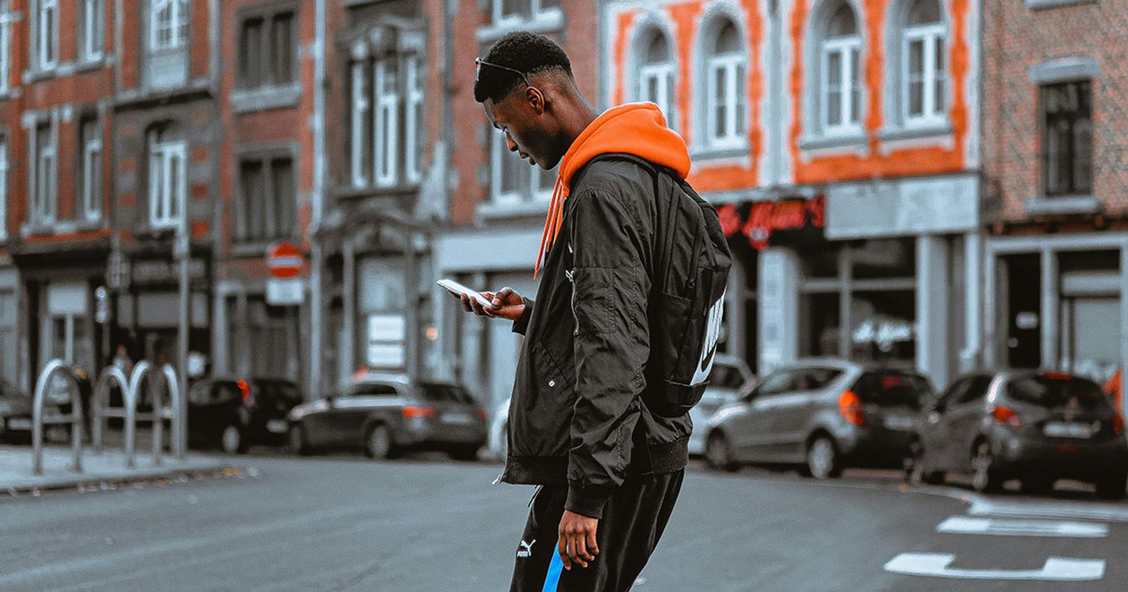 man with phone for high-converting sms marketing