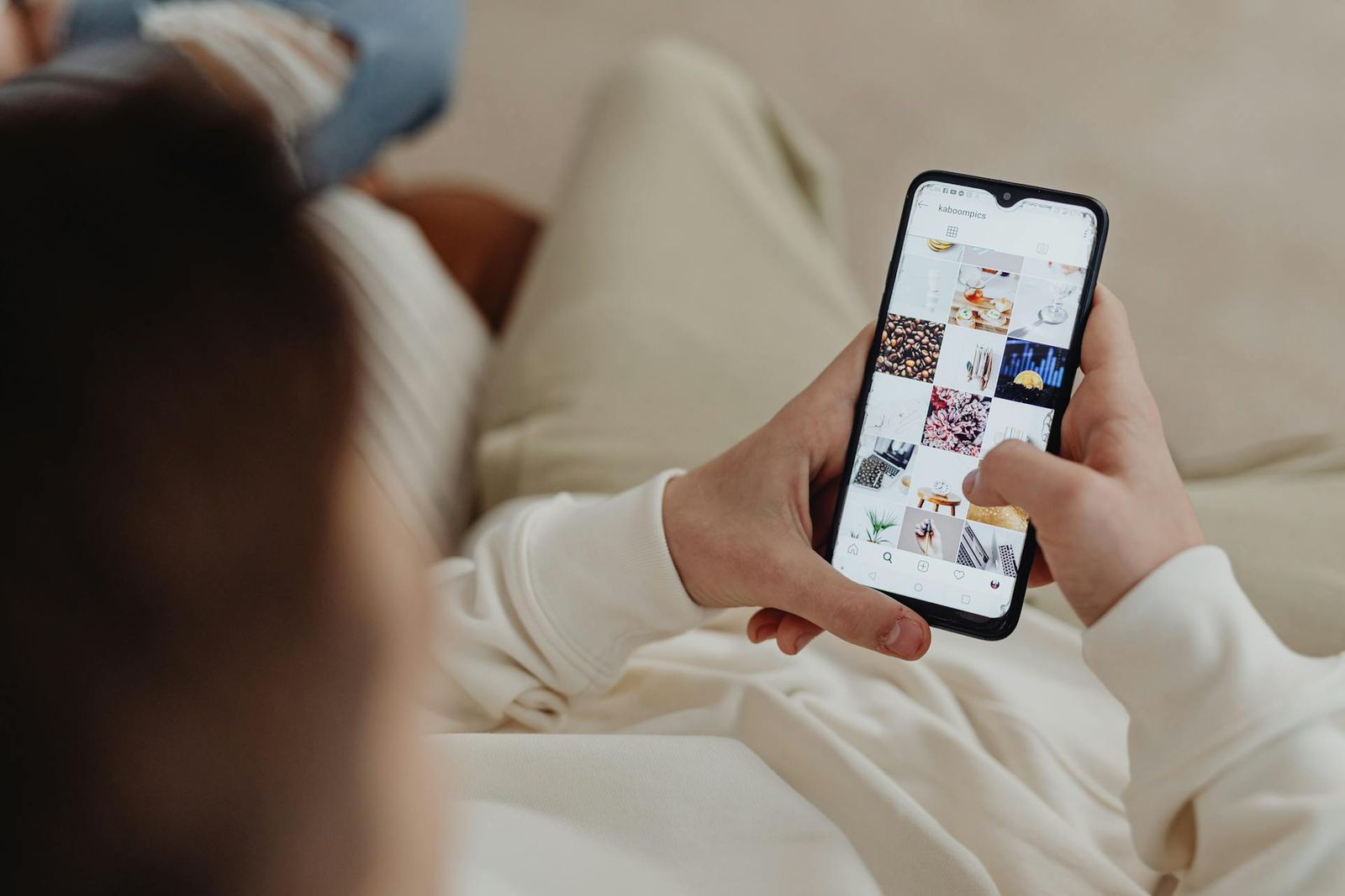 woman with phone on instagram