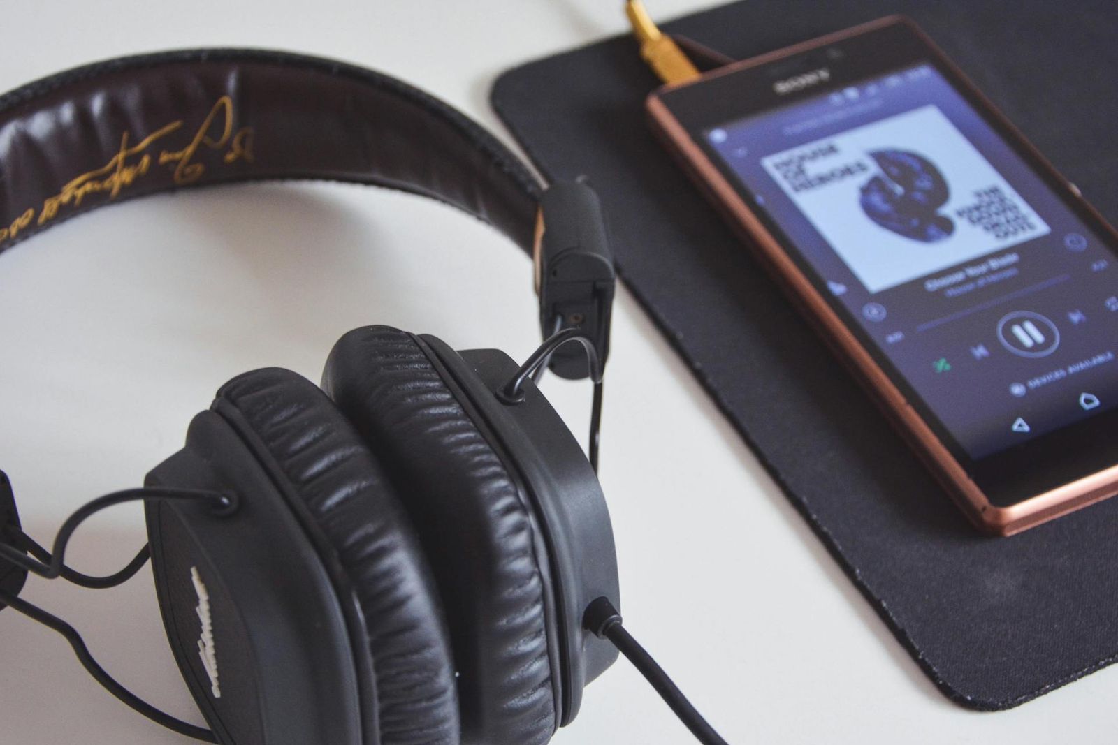 headphones and phone playing music