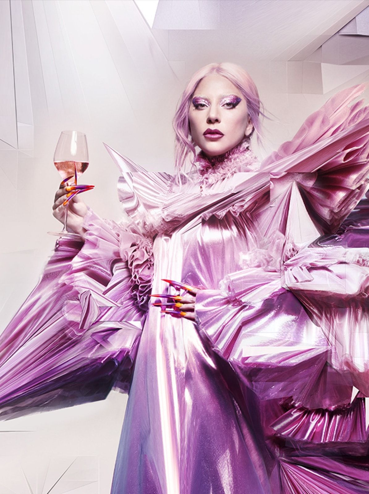 Lady Gaga posing with a glass of Dom Pérignon