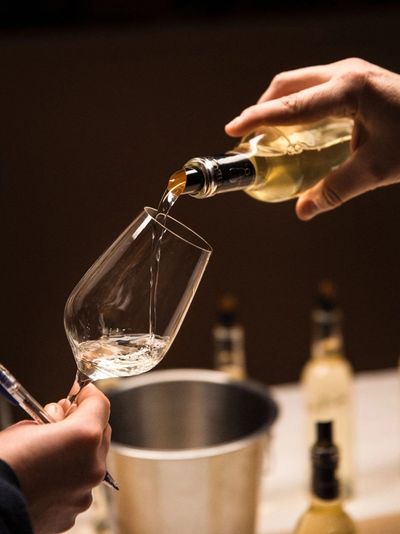 Pouring of white wine