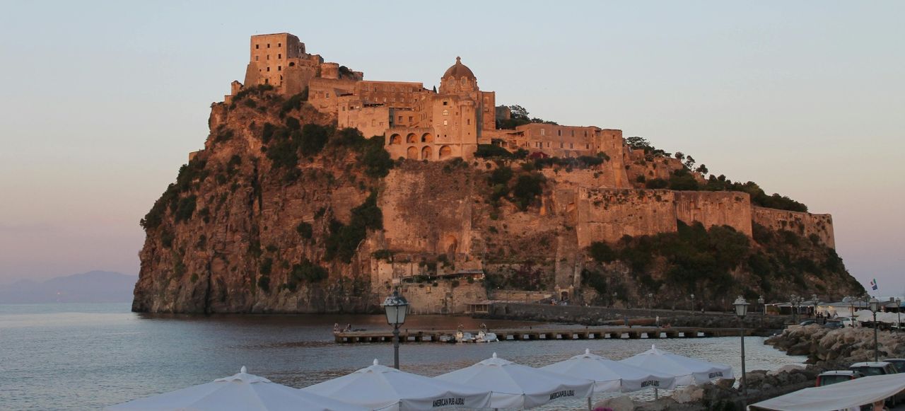 Stunning View of Aragonese Castle at Sunset, Ischia