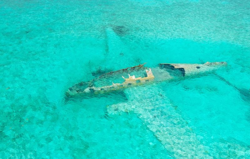 Famous Staniel Cay plane wreck near the Compass Cay island, Exumas, Bahamas