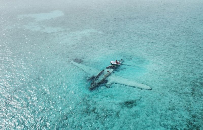 he wreckage of a Curtiss C-46 Commando that crashed in shallow water at Norman's Cay