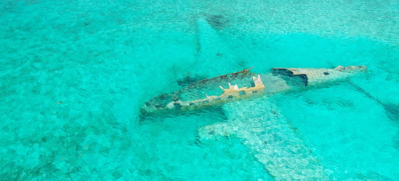 Famous Staniel Cay plane wreck near the Compass Cay island, Exumas, Bahamas