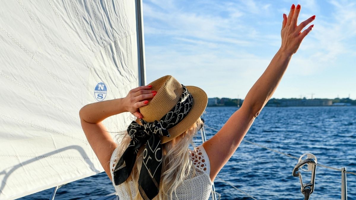Woman Enjoying Leisure on a Yacht