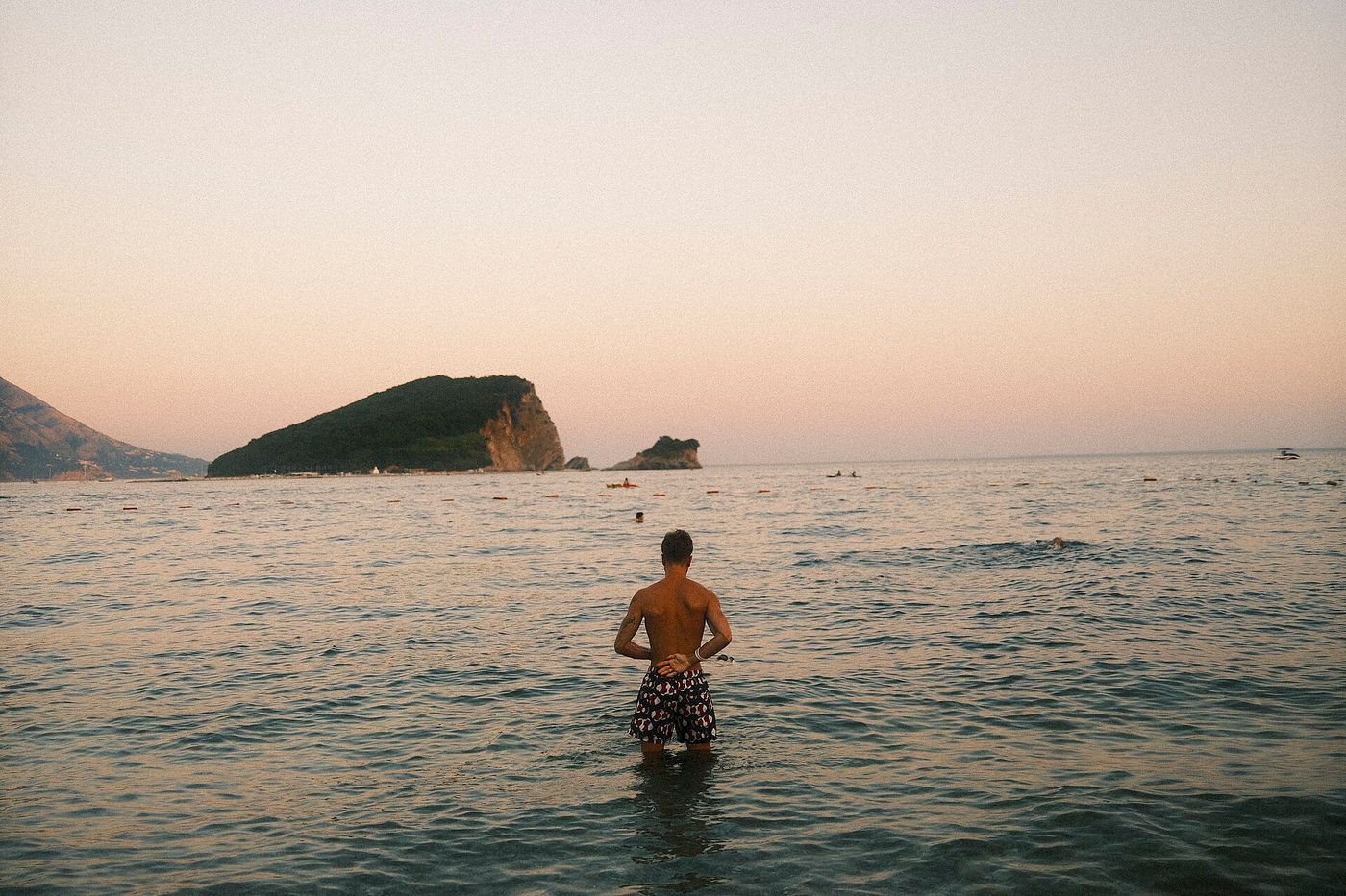 The seaside, at dusk.