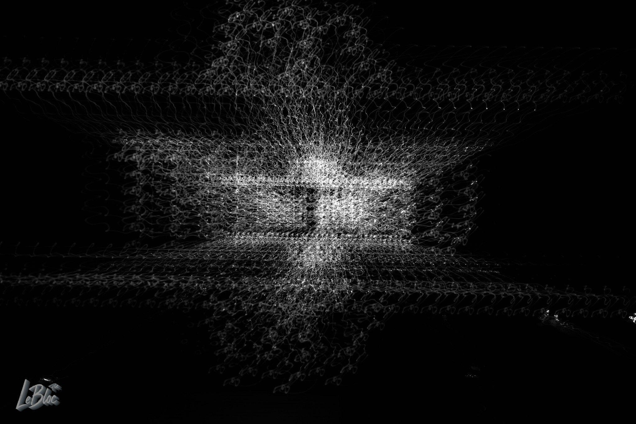 A compact radiant core expands into fine repeated silver lines