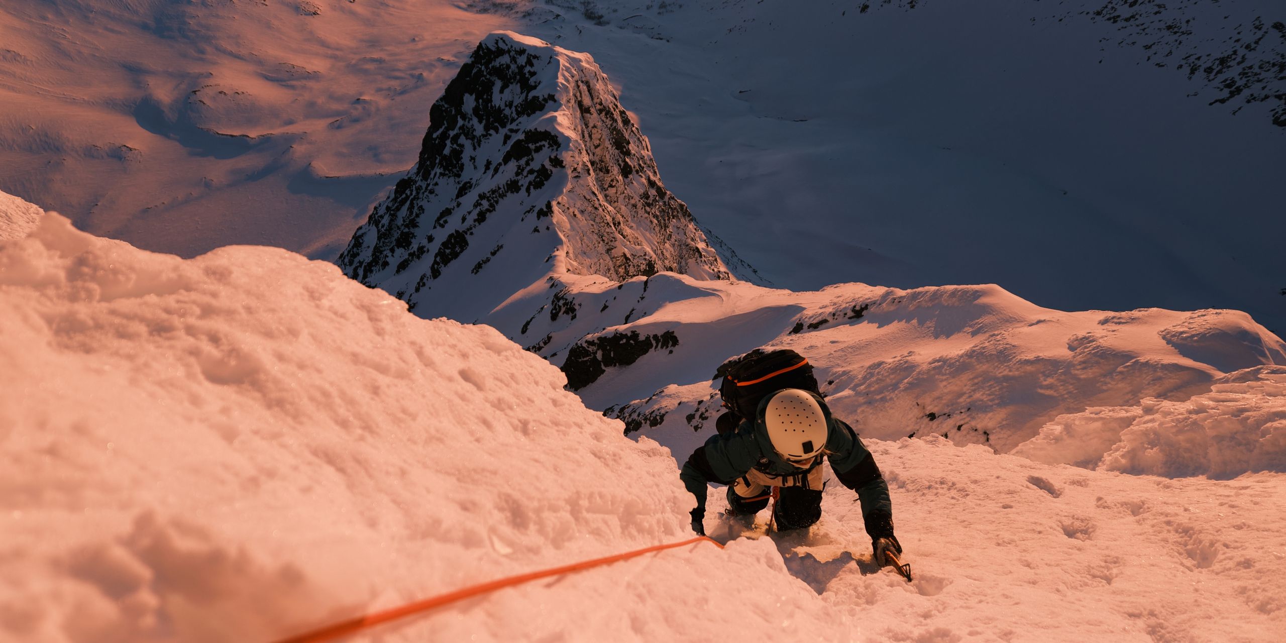 Hedvig Wessel is climbing a mountain wearing her new POC signature collection