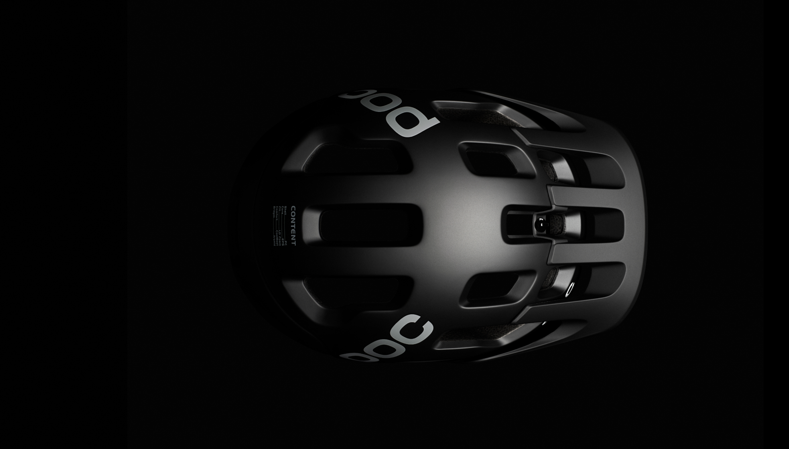 Black POC Tectal helmet with a black background