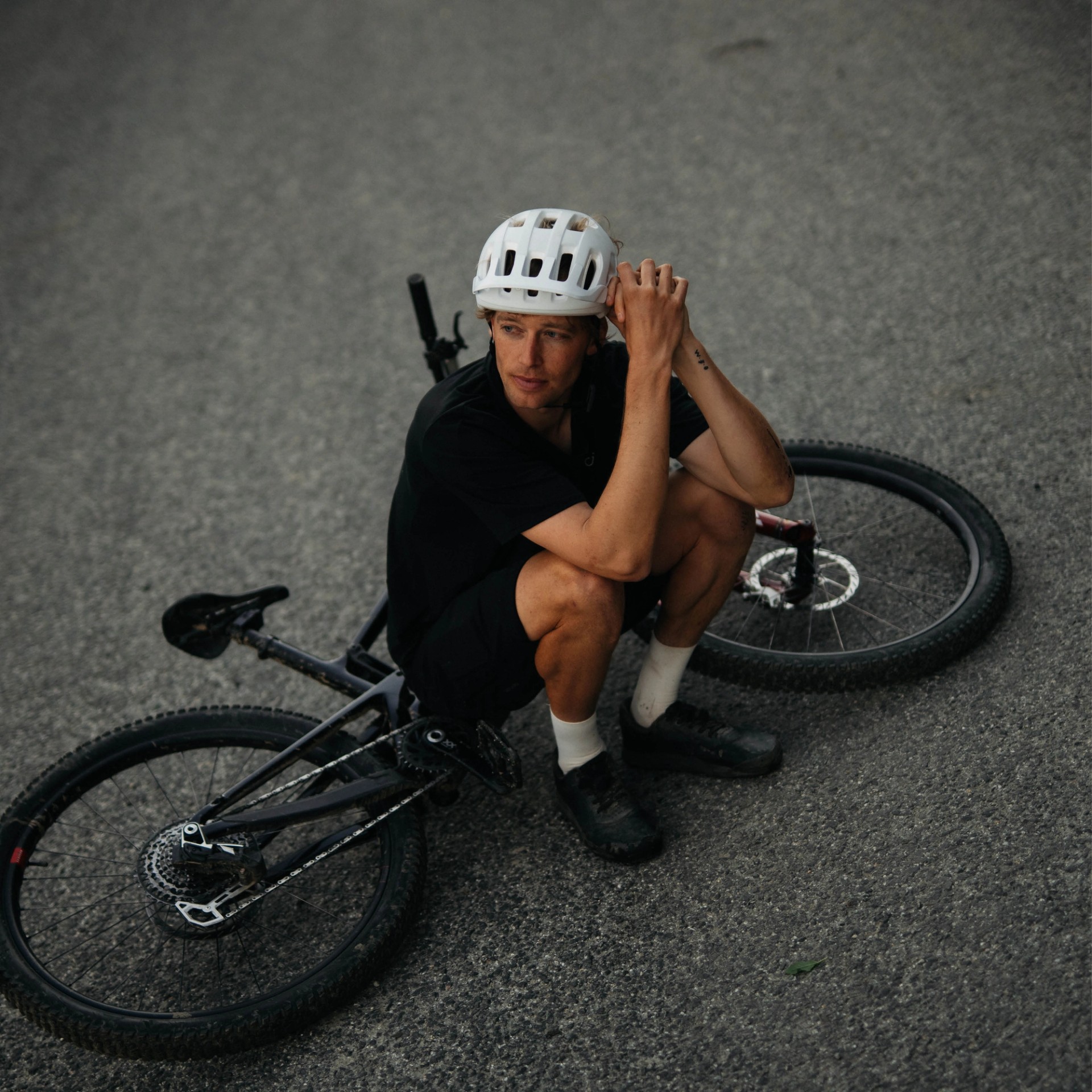 Ben Hildred sitting on bike with white Cularis helmet