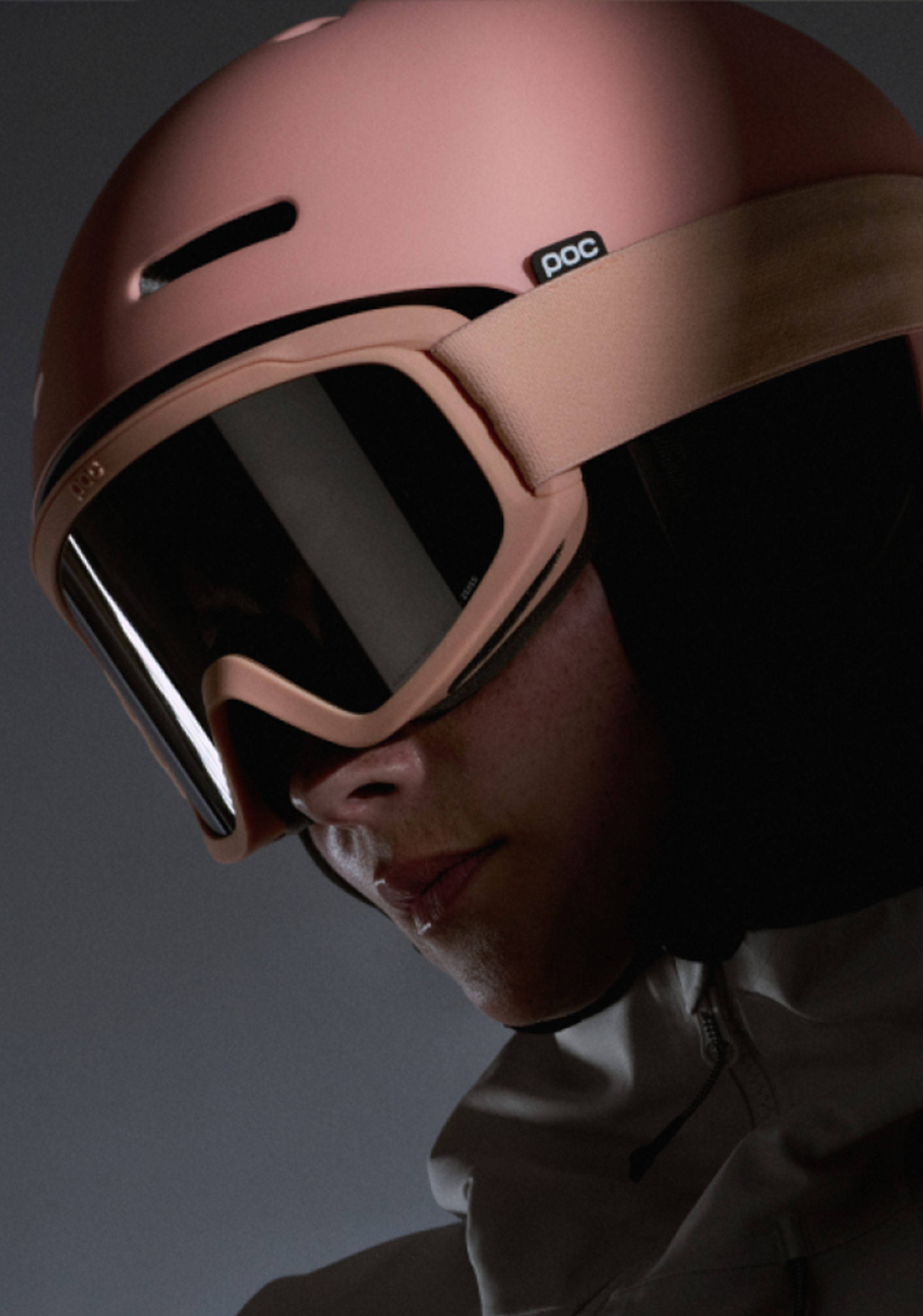 Woman wearing POC ski helmet and goggle