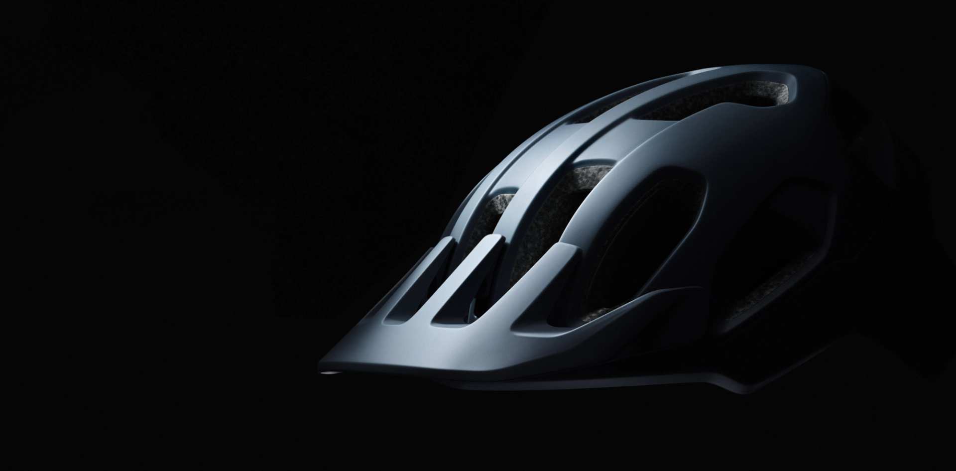 A black Cularis mountain bike helmet on a black background.
