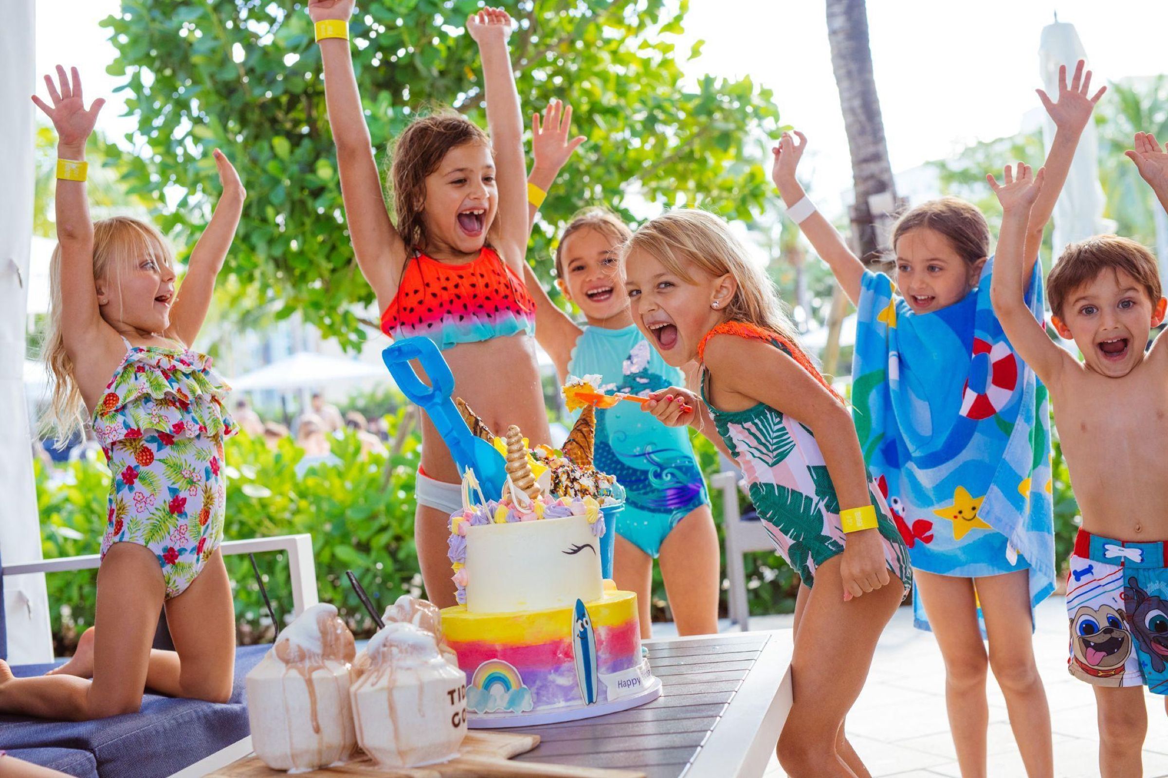 Kids cheering in the water at the Tidal Cove waterpark
