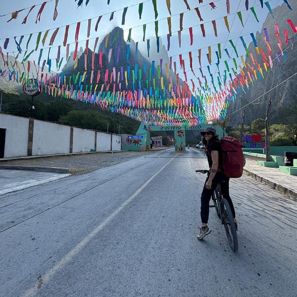 Steph biking into the park