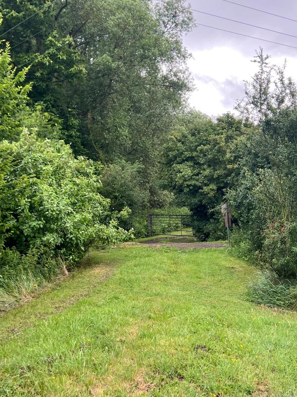 The gate down to the nature reserve