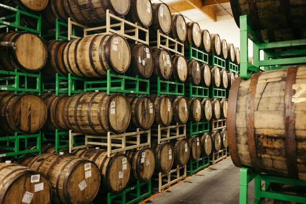 Barrels of beer in racks aging in Sierra Nevada's cellar