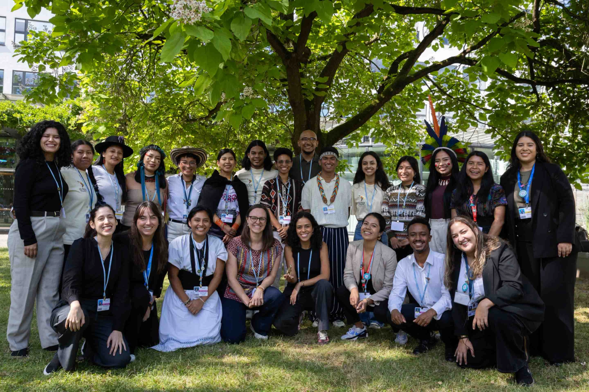Members of a LAYCS cohort together outdoors at a climate conference.