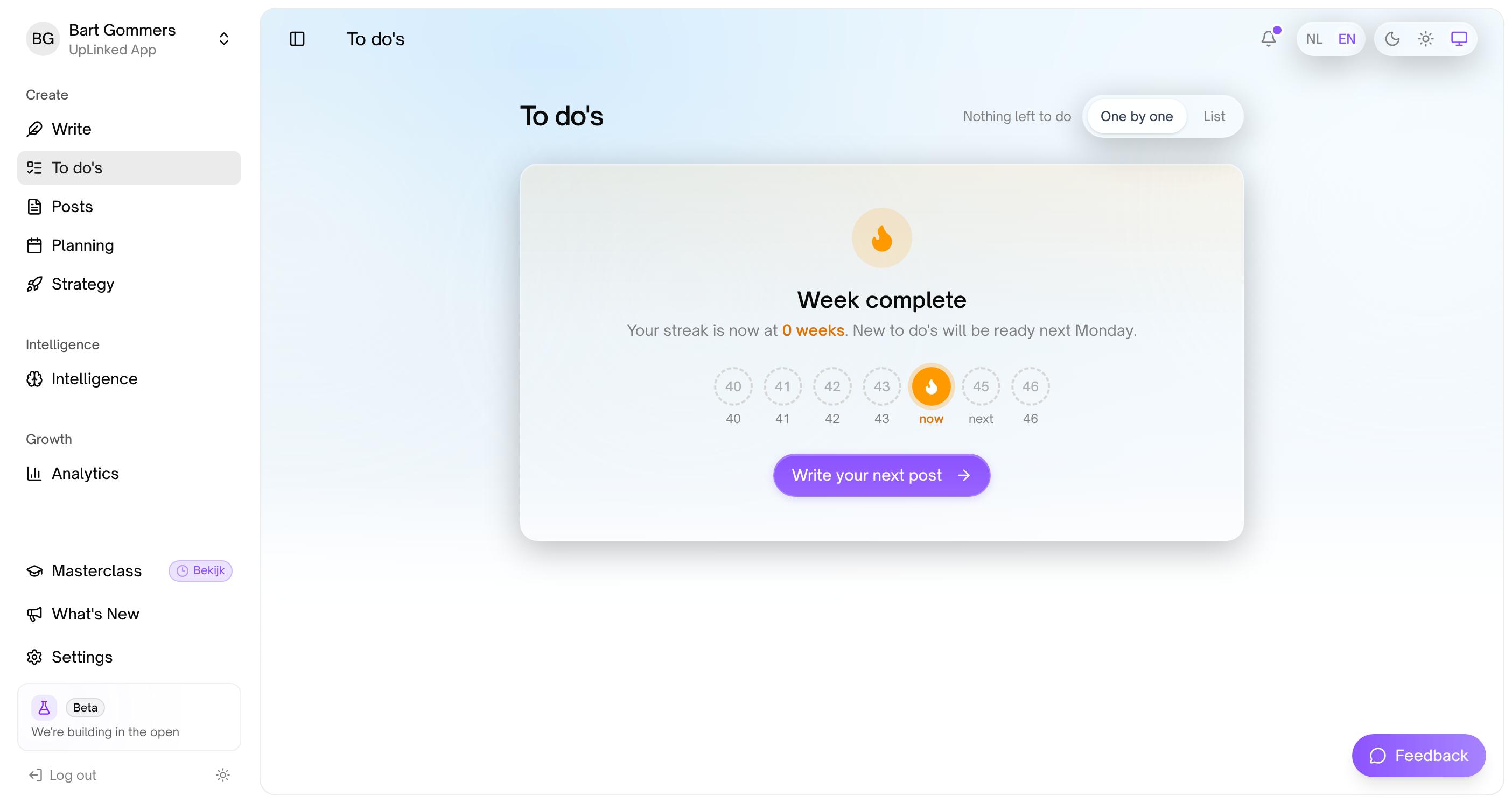 The To do’s page: “Week complete”, a row of week numbers with the current week marked by a flame, and a button to write the next post.