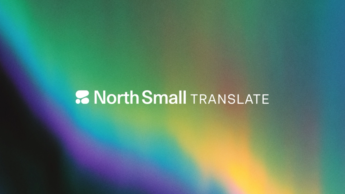 A header image, depicting the model North Small Translate, backed by beautiful northern lights on a night sky.