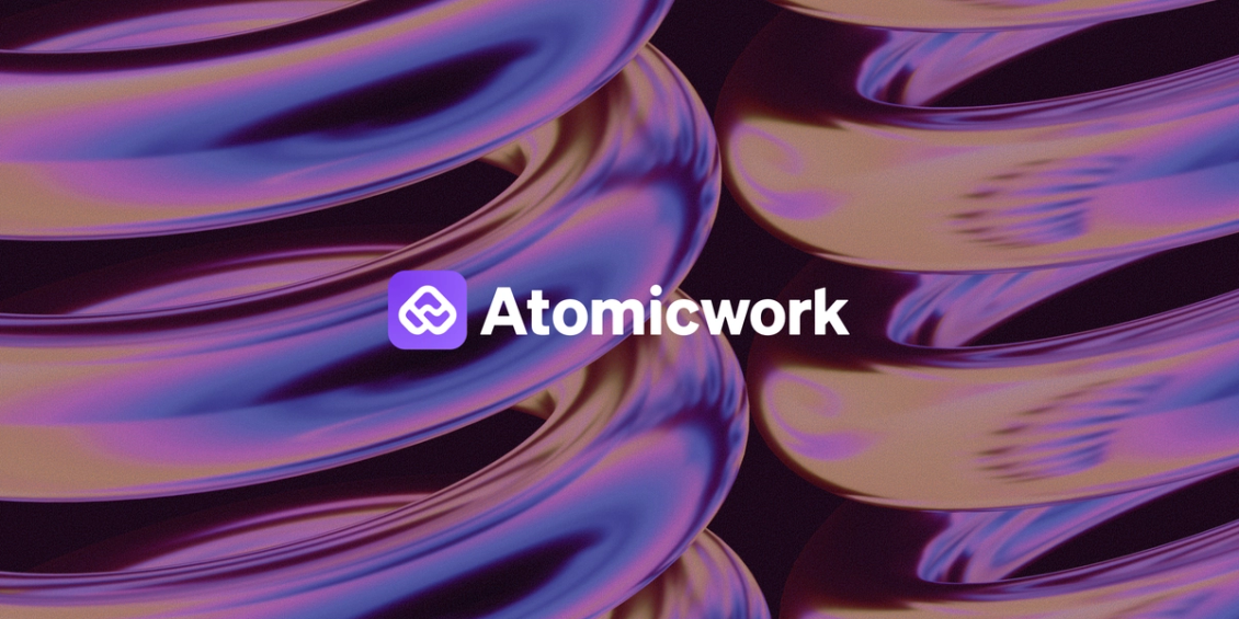 Abstract purple and gold flowing shapes with the Atomicwork logo centered in white.