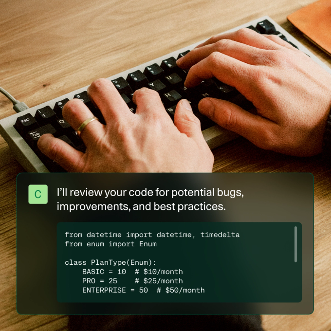 A person typing on a mechanical keyboard at a desk. In the foreground, a dark translucent UI-style overlay displays a message saying “I’ll review your code for potential bugs, improvements, and best practices.” Below the message is a code snippet defining a PlanType enum with BASIC, PRO, and ENTERPRISE pricing values.