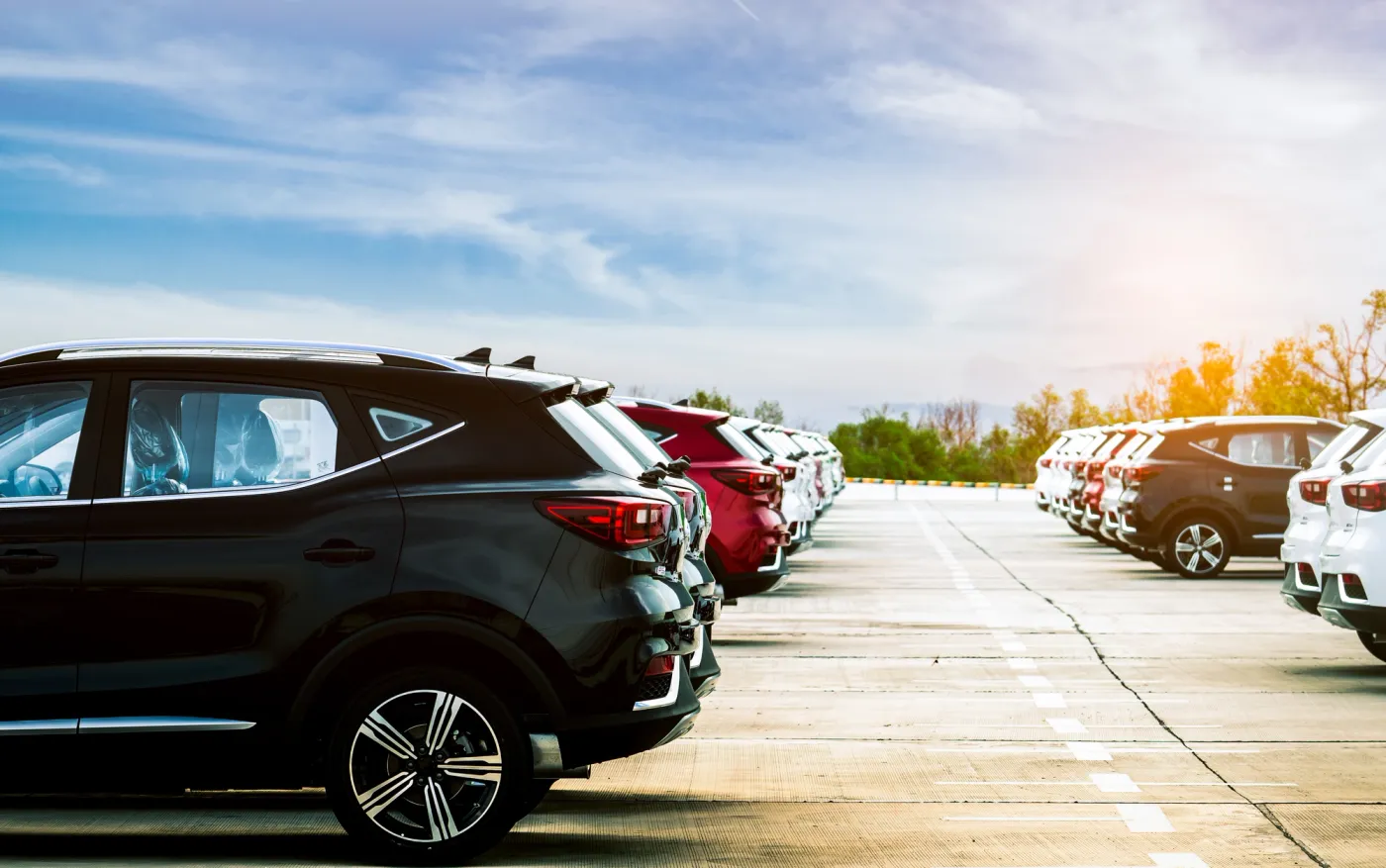 Luxury black, white and red new suv car parked on concrete parki
