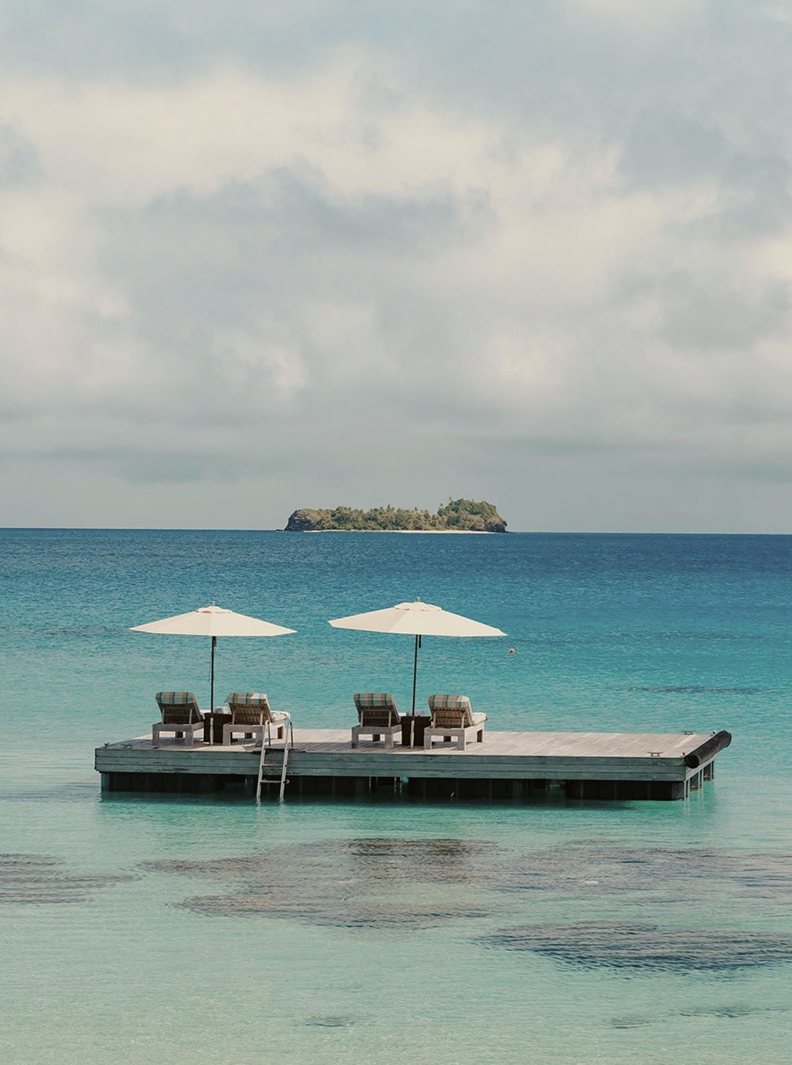 Lounge by the turquoise waters of the South Pacific