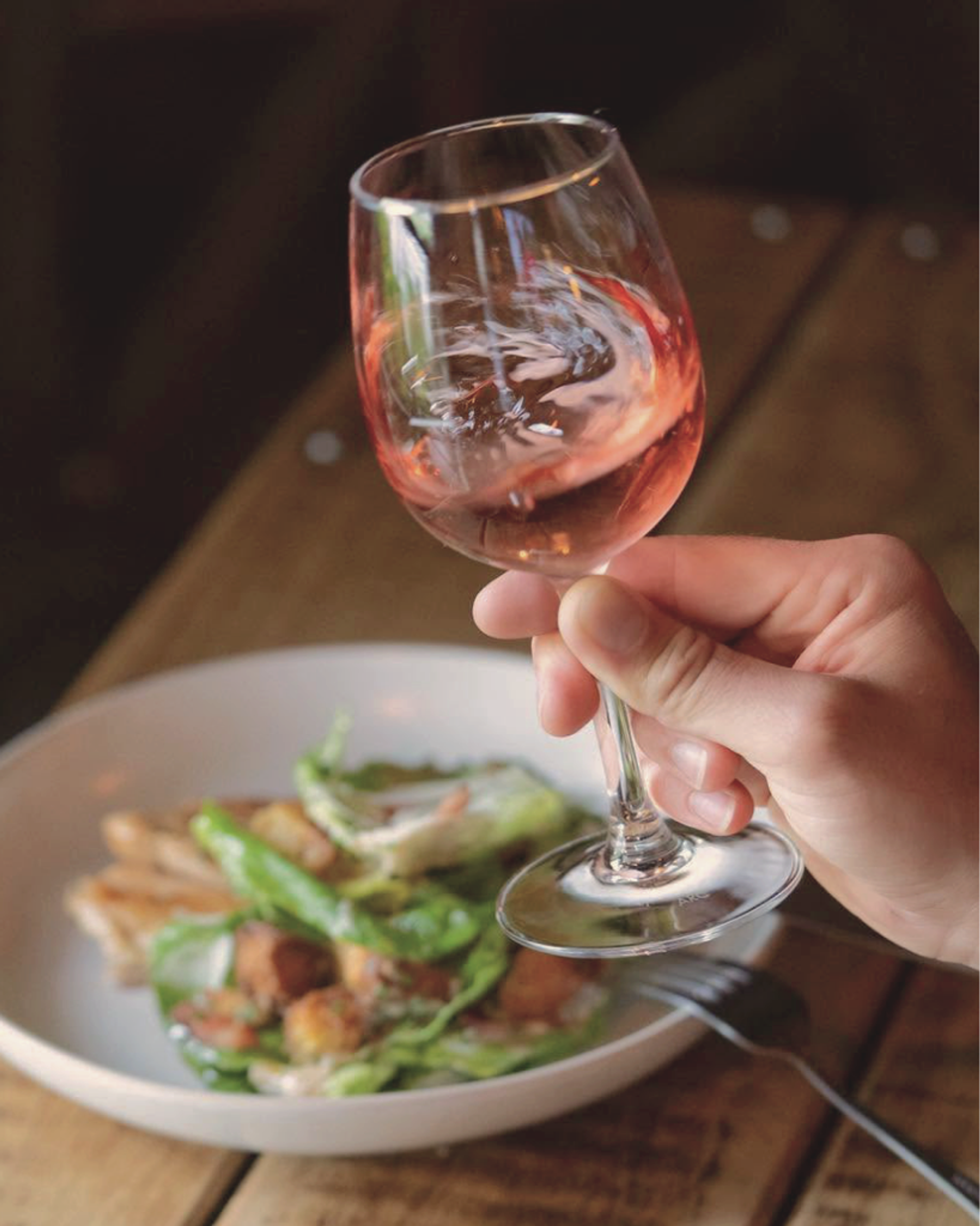 A glass of rosé served with a local meal