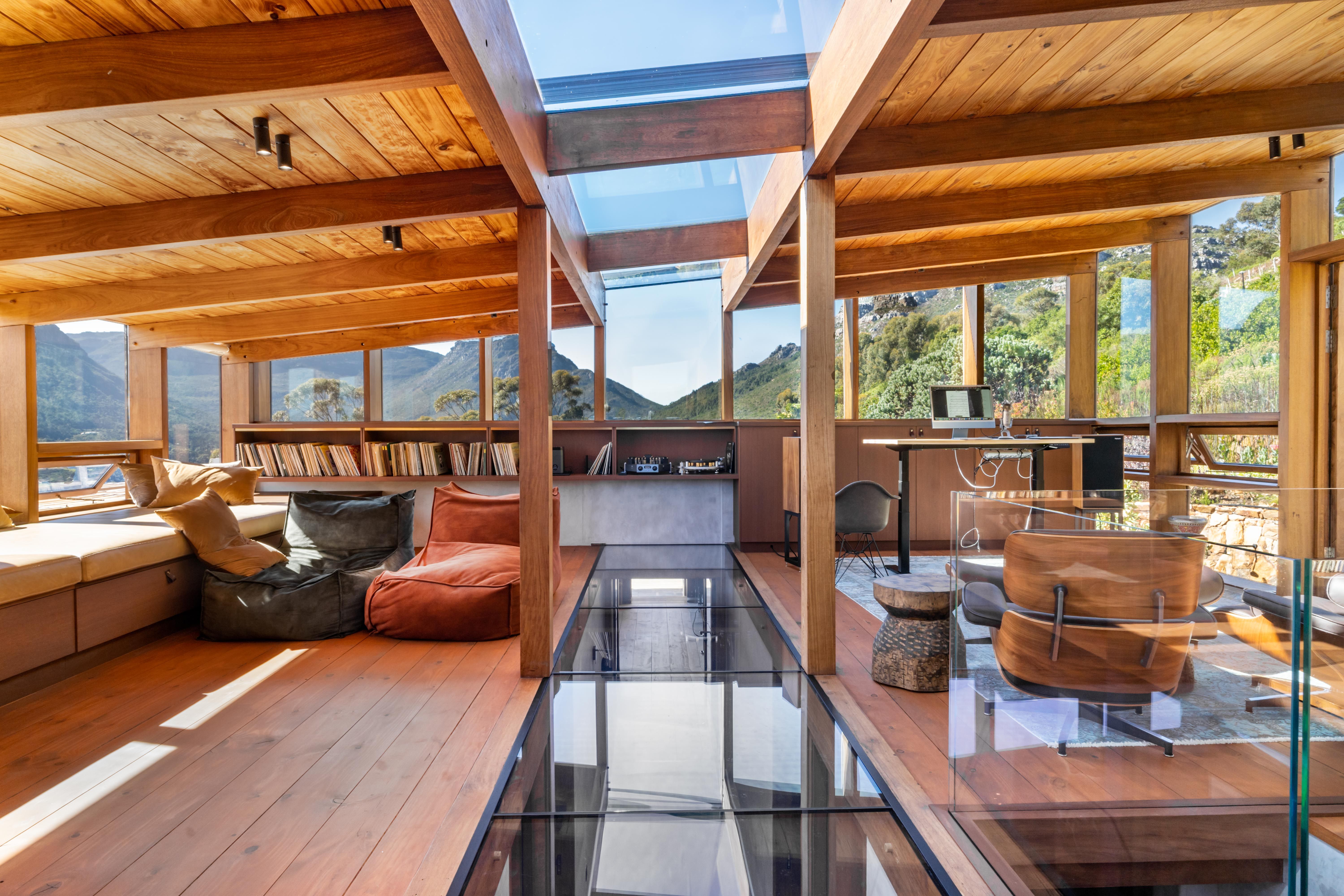 Upstairs studio with 1,000+ vinyl collection, beanbags, glass floor