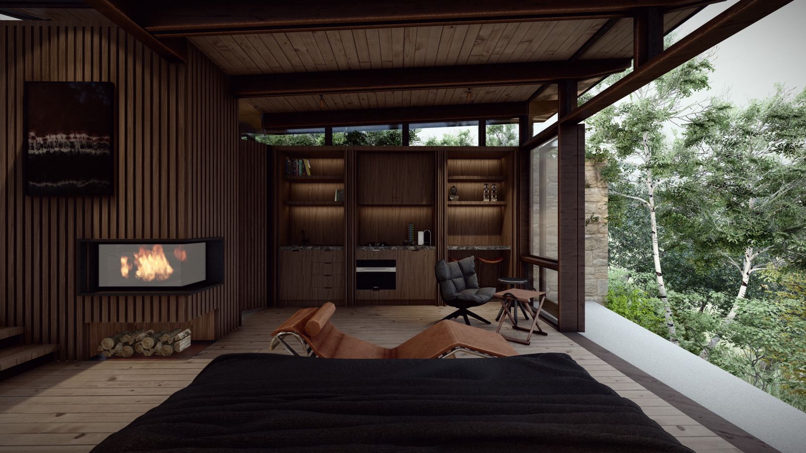 Two leather chaise longues facing a wood-clad wall with fireplace; kitchenette behind; large glass sliding door to fynbos on the right