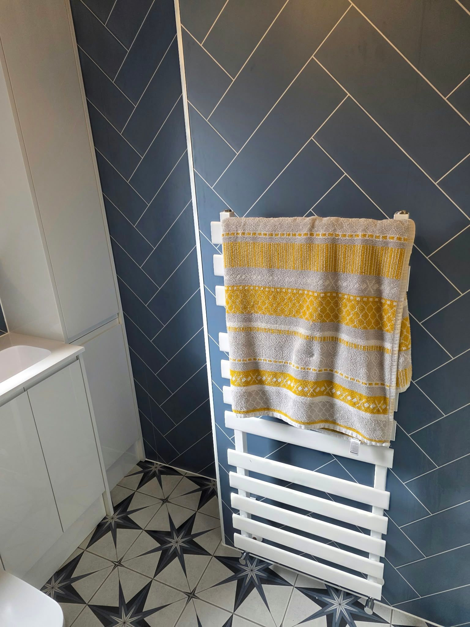 Brass detail bathroom with aqua boards, Rugby