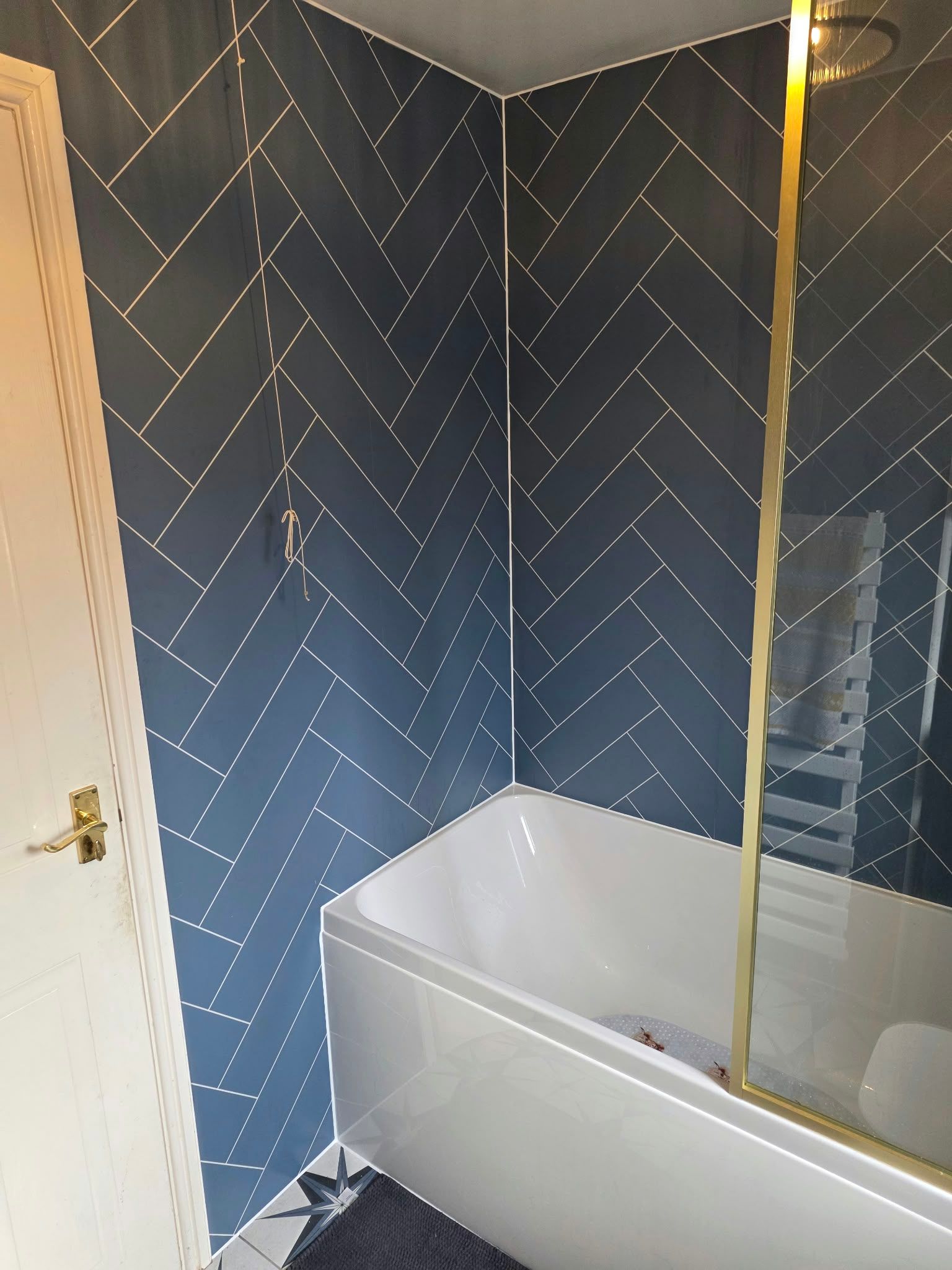 Brass detail bathroom with aqua boards, Rugby