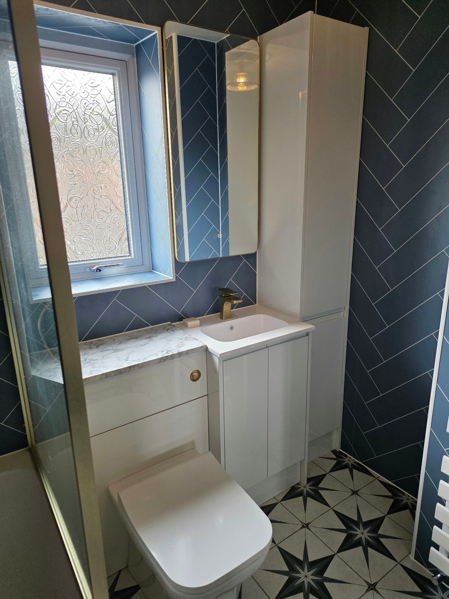 Brass detail bathroom with aqua boards, Rugby