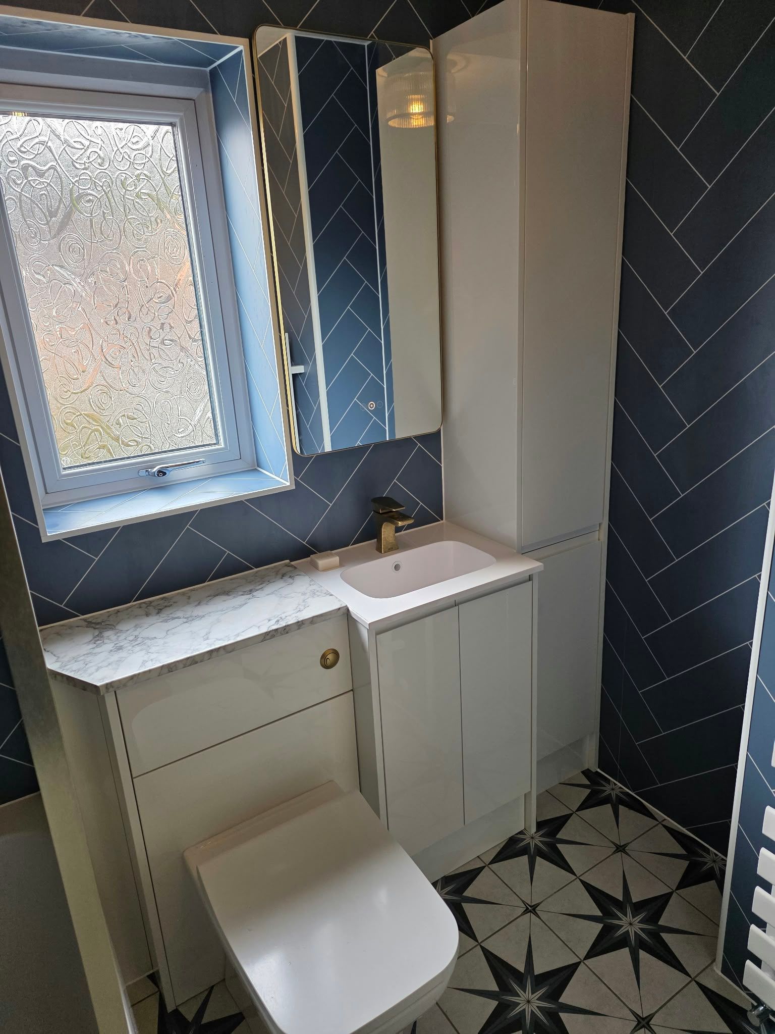 Brass detail bathroom with aqua boards, Rugby