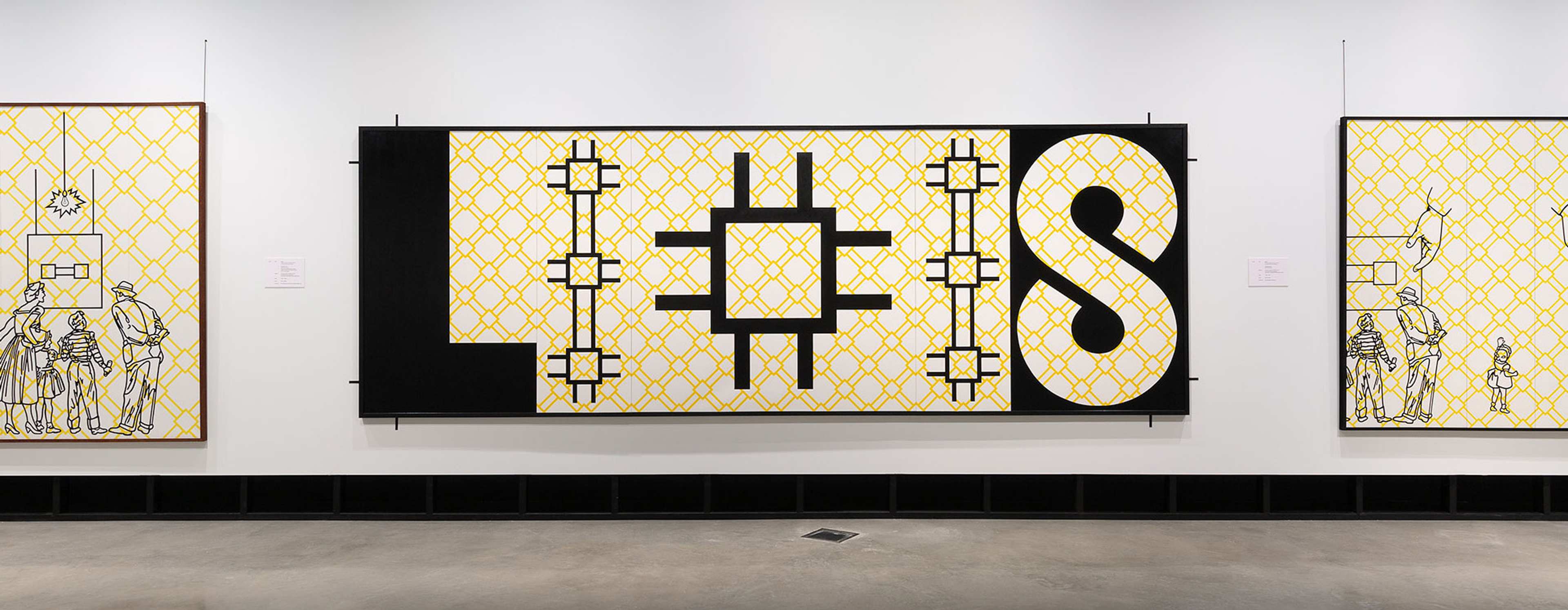 A gallery wall displays twelve framed geometric yellow artworks arranged in front of a net-like installation. The floor is polished, and a simple wooden bench sits in the foreground.
