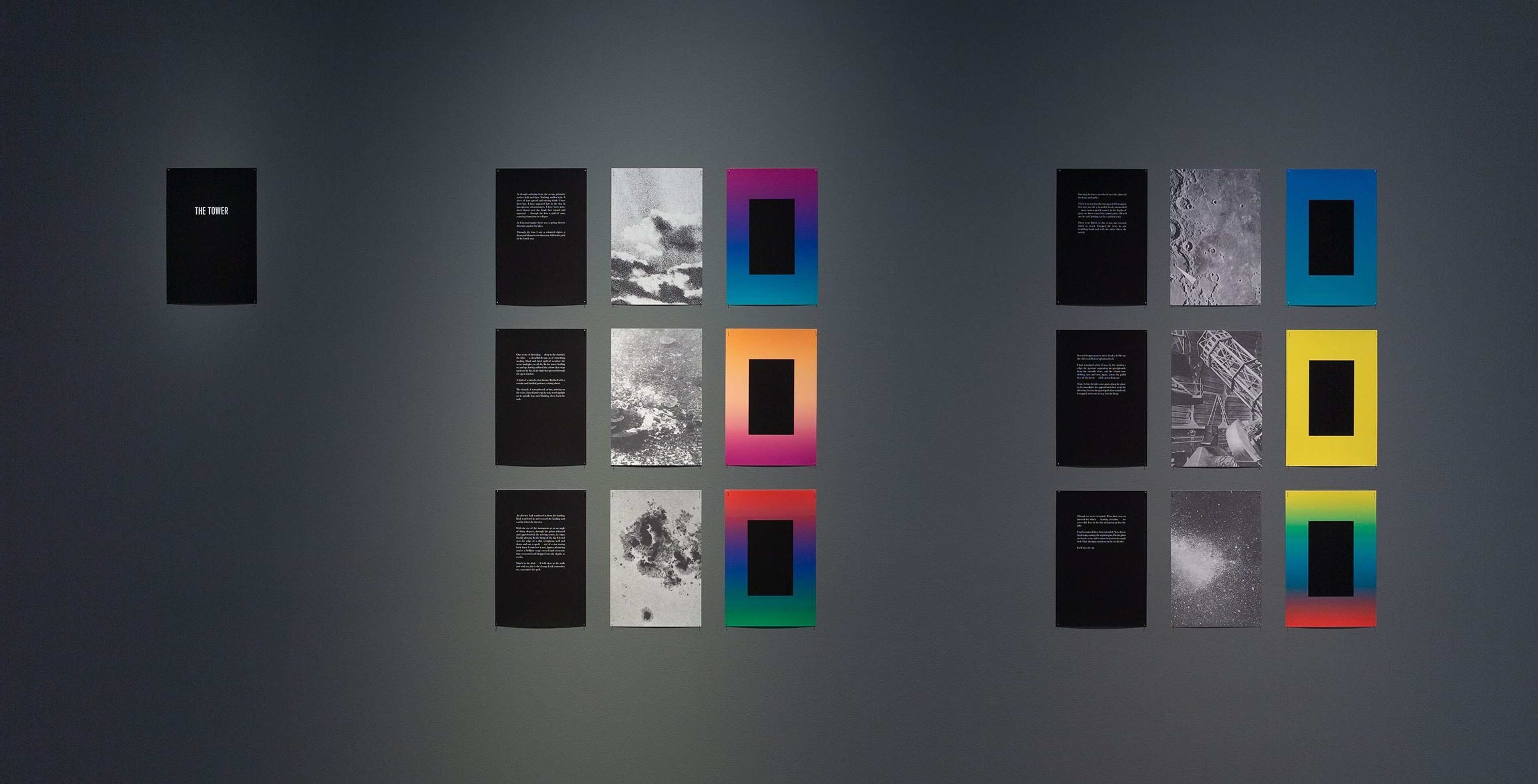 Art installation on a dark wall featuring two columns of black panels with text, each paired with panels containing grayscale images and panels bordered by vibrant gradient colors. A single black panel with white text is on the far left.